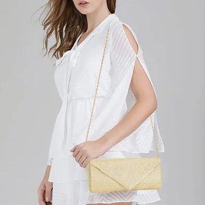 Gold evening clutch/purse w/chain